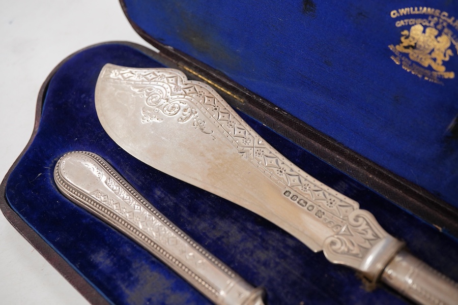 A cased pair of Victorian silver fish servers, with beaded handles, Martin, Hall & Co, Sheffield, 1871, knife 28.7cm.